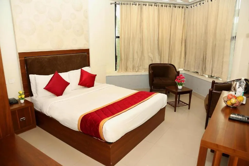 Royal Plaza Glitz Inn 科泽科德